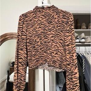 Mock neck smocked zebra print top